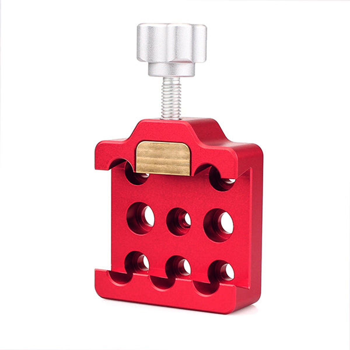 Red tool with a silver top and gold accent on a white background
