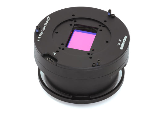 Camera lens or filter with a pink square in the center on a white background