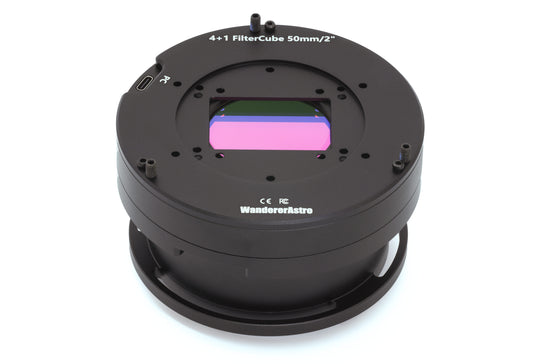 Black filter wheel with a filter insert on a white background