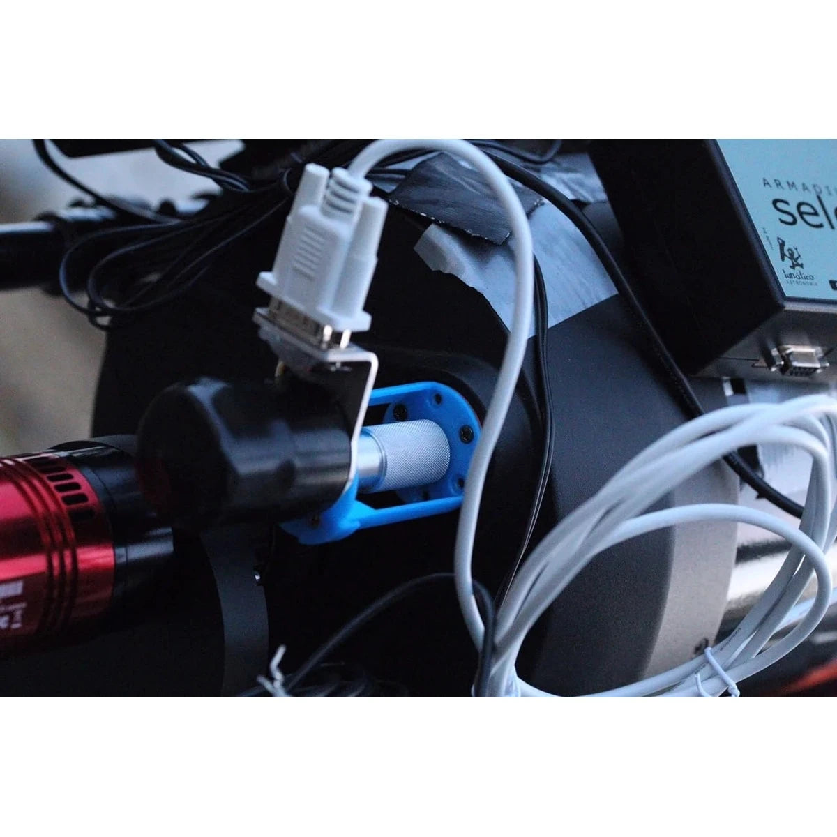 Close-up of electronic components with wires and connectors on a blurred background