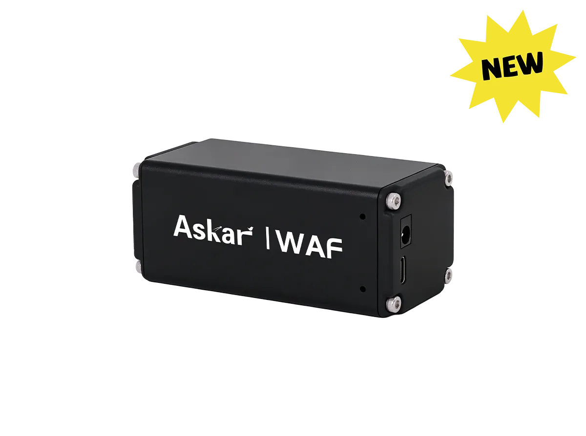 A black rectangular electronic device labeled 'Askar | WAF' in white text, shown on a plain white background with a yellow starburst 'NEW' badge in the top right corner.