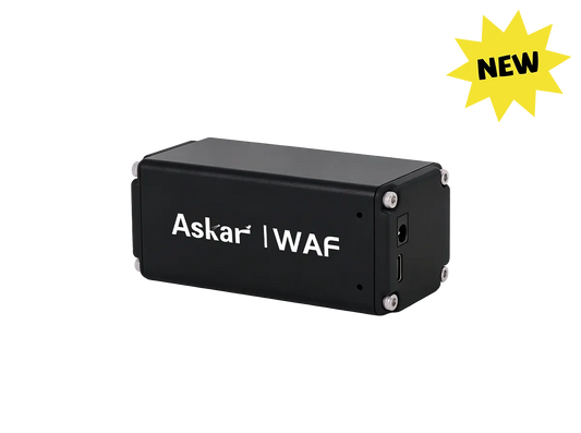 A black rectangular electronic device labeled 'Askar | WAF' in white text, shown on a plain white background with a yellow starburst 'NEW' badge in the top right corner.