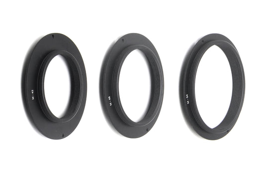 Astroasis filter drawer adapter set showing M42, M48, and M54 threaded adapter rings for astrophotography
