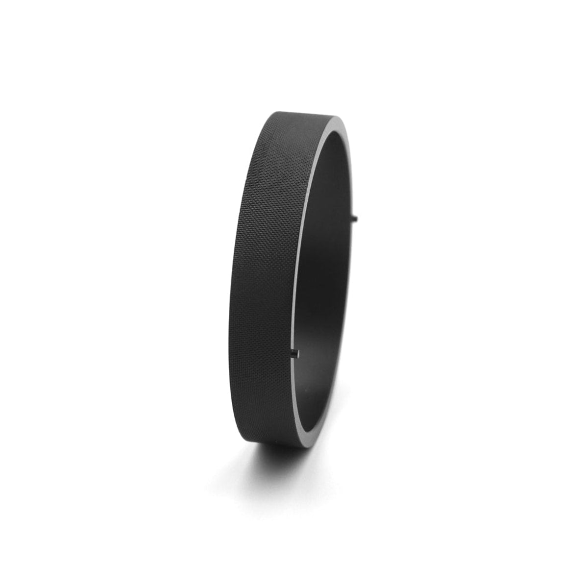 Side view of the Astroasis filter drawer ring showing textured grip surface and alignment pins

