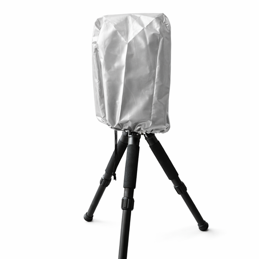 Silver protective telescope cover fitted over a Seestar S50 on a tripod