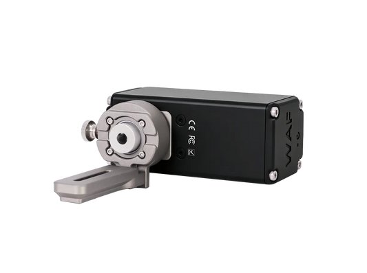 A black rectangular electronic device with a silver motor or sensor module and a gray mounting bracket, shown on a plain white background. The side of the black casing has the brand name 'WAF' printed vertically.