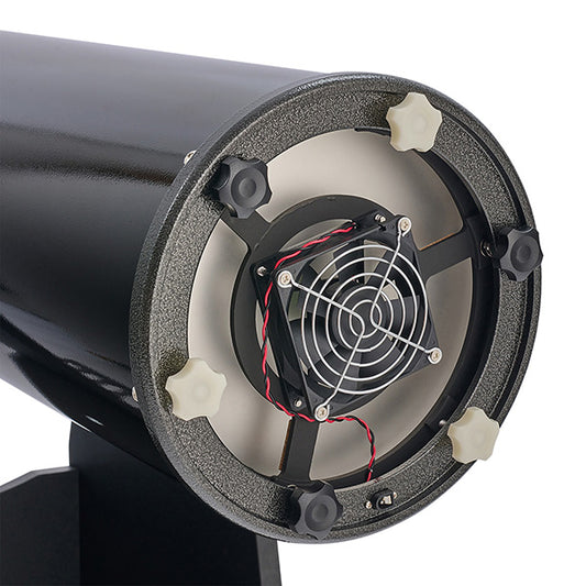 Close-up of a black cylindrical object with a fan inside on a white background