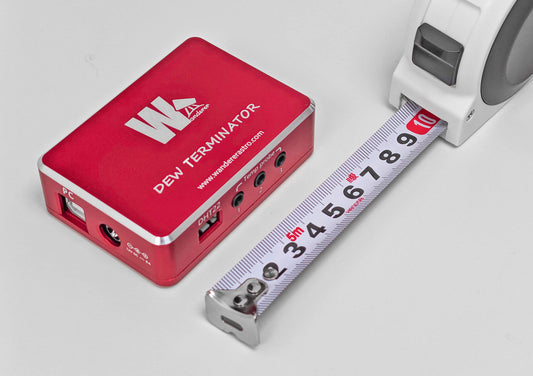 WandererAstro Dew Terminator controller shown next to a tape measure to illustrate compact dimensions
